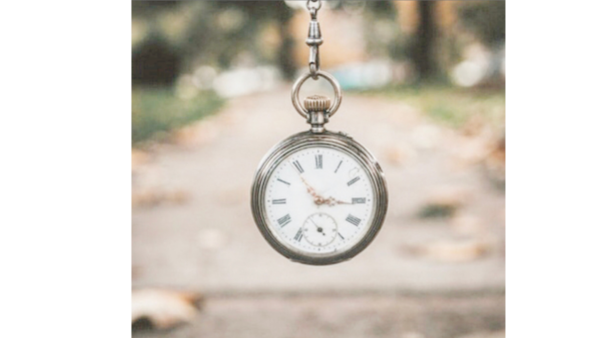 for website featured image old fashioned stop watch with autumn leaves in the background