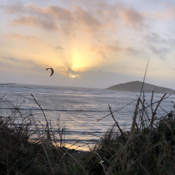 Peaceful sea at sunset representing clarity and choosing which balls to catch in life