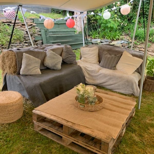 image of l shaped sofa made from hay
